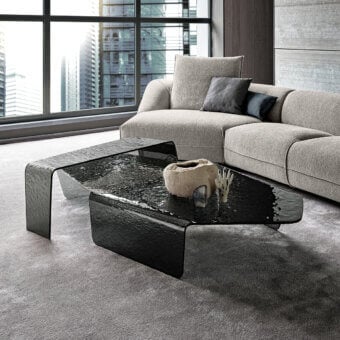 Captivating Arketipo Chimera coffee table crafted in deep black curved and hammered glass with a glossy finish