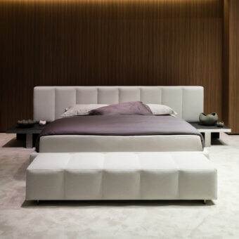Distinguished Arketipo Milky Way Dream bed crafted in Italy with matte woven textile and rounded contours in off-white with purple undertones