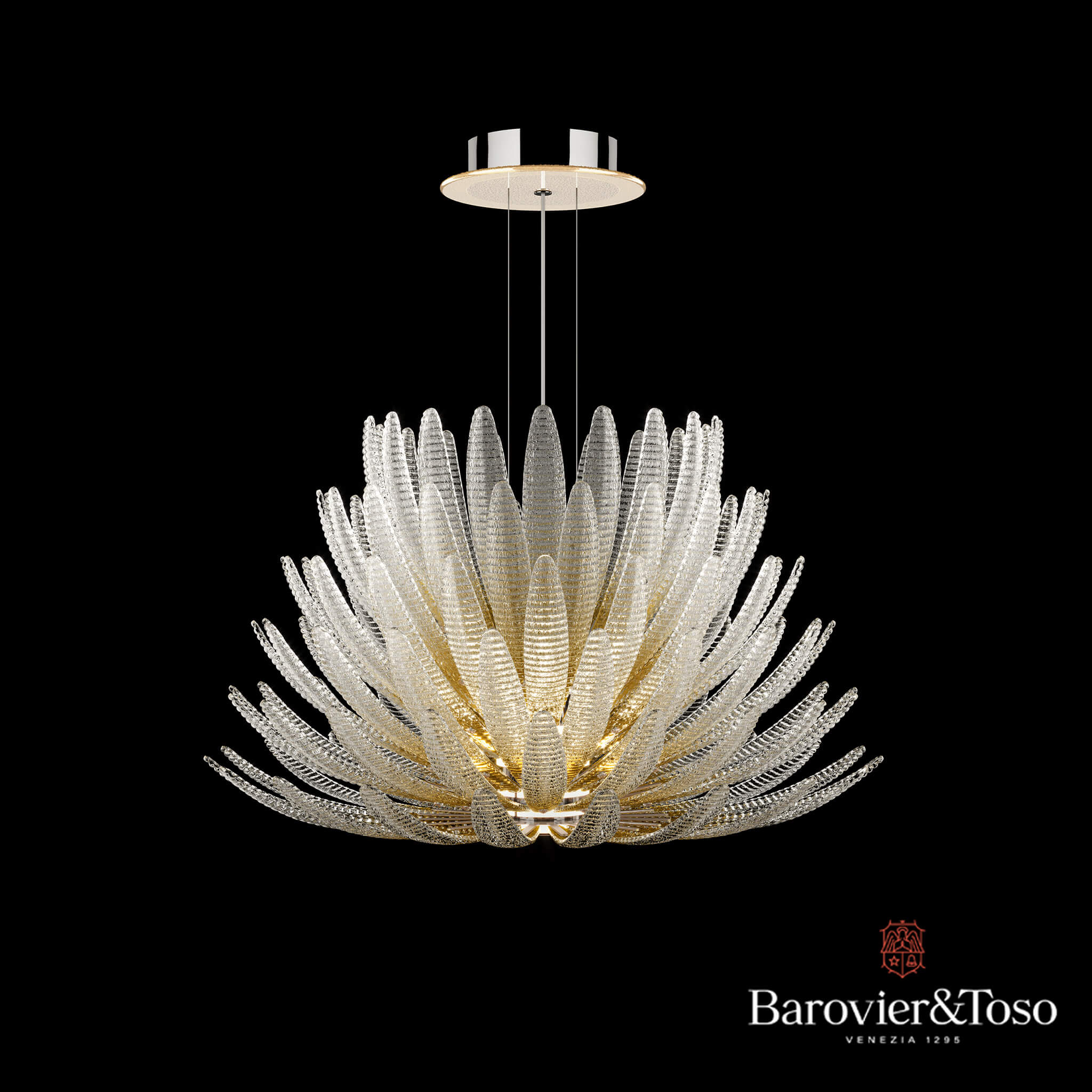 Agave suspension lamp, clear glass, radiating floral design with iridescent elements and warm golden illumination, Barovier&Toso Venezia.