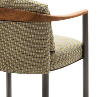 Lavish Giorgetti Moorea armchair with pewter painted stainless steel frame and muted olive green fabric upholstery