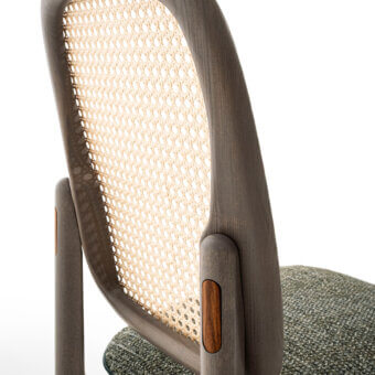 Exceptional Giorgetti Plume chair with solid ash wood, Viena straw backrest, and dark green textile upholstery with leather piping