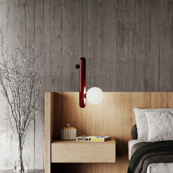 Distinguished Italamp Gocce suspension lamp with a reddish-brown polymer structure and luminous white glass diffuser in satin finish