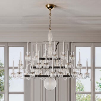 Superior Italamp Keplero chandelier crafted with crystal, glass, and polished gold-toned metal exhibiting a sinuous arrangement