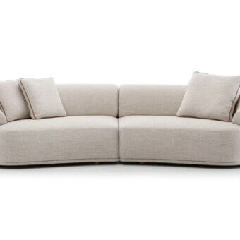 Lavish Pacini & Cappellini Bond sofa built with soft light beige velvet upholstery and a solid wood structure with painted feet