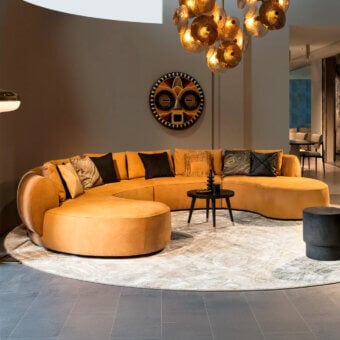 Sumptuous Sicis Botero sectional with enveloping curved form and plush golden-yellow velvet upholstery built with solid timber frame