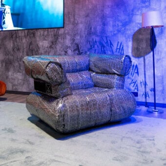 Exclusive Joker Home Collection Asylum lounge chair with silvery-grey carbon fabric and dark charcoal textile details, lasered base