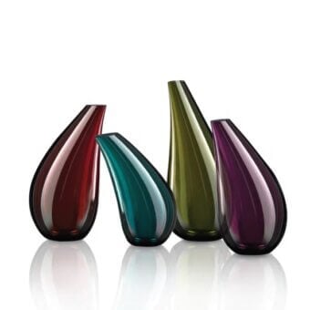 Stunning Wave Murano Glass Avena vase exhibiting a rich purple hue and smooth curved lines crafted from exquisite Murano glass with polished finish