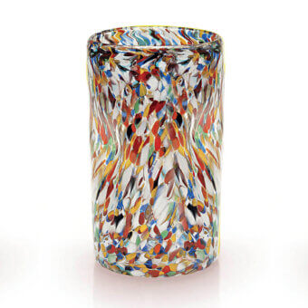 Glass vase, multicolored spotted glass, cylindrical shape with yellow rim and base, studio product shot on white background.