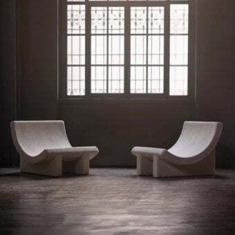 Exceptional Acerbis Trench lounge chair crafted in Italy with textured neutral bouclé and matte finish