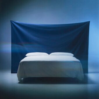 Distinguished Bolzan Letti Backdrop headboard crafted in blue felt with quilted detailing and a fine oil finish
