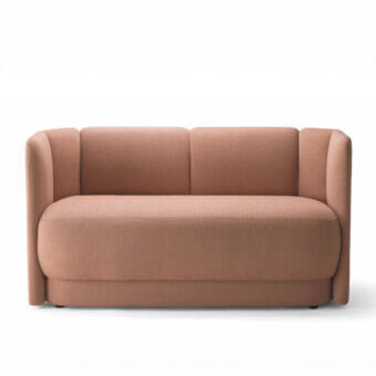 Captivating Bross Velia sofa with gently curved form and sculpted shell upholstered in terracotta textile crafted in Italy