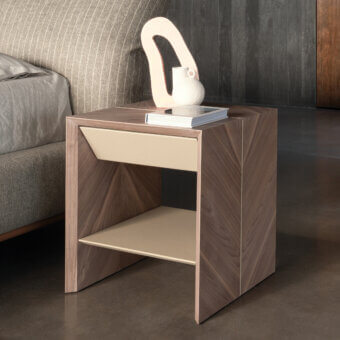 Distinguished Cierre1972 Avalon nightstand in richly grained wood with satin finish and subtle beige inset offering sculptural design