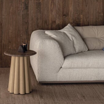 Distinguished Cierre1972 Budino side table in warm beige textured material with a satin wood tabletop