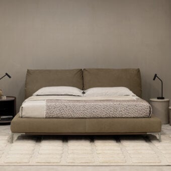 Harmonious Cierre1972 Chapeau Bed in muted taupe textile with reclining headboard and dark tapered metal legs