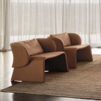 Distinguished Cierre1972 Knight lounge chair with warm medium brown leather upholstery and smooth matte finish