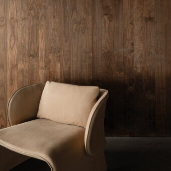Refined Cierre1972 Knight lounge chair upholstered in smooth beige leather with gently curved lines