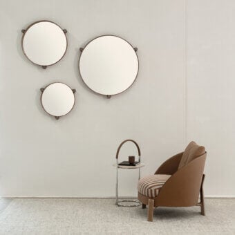 Exceptional Cierre1972 Miro mirror crafted with medium-brown leather and glass, displaying a smooth satin finish