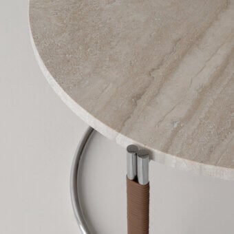 Distinguished Cierre1972 Otto coffee table with textured stone, woven textile and polished metal base