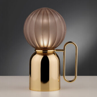 Elegant Euroluce Atlas table lamp with a glossy golden metal base and translucent rose-gold textured shade