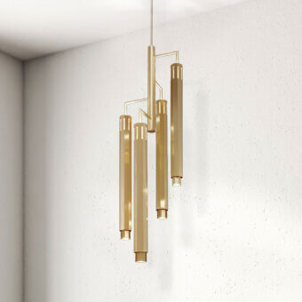 Architectural Euroluce Castel suspension lamp in satin brass with translucent amber glass cylinders casts direct and ambient light