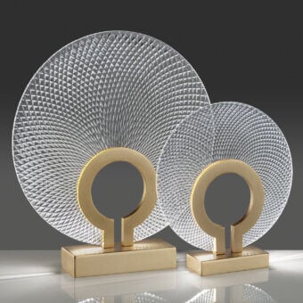 Distinctive Euroluce Corallo table lamp crafted in textured glass with golden-toned metal, exhibiting a radiating faceted shade and curved form