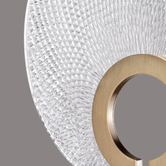 Superior Euroluce Corallo table lamp crafted in clear glass with golden metal and a deeply textured, faceted surface