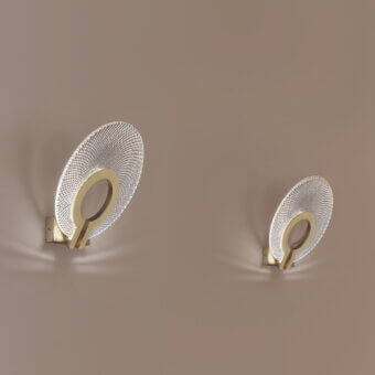 Distinctive Euroluce Corallo wall lamp with a delicate oval silhouette and hand-ground satin gold finish radiating soft brilliance