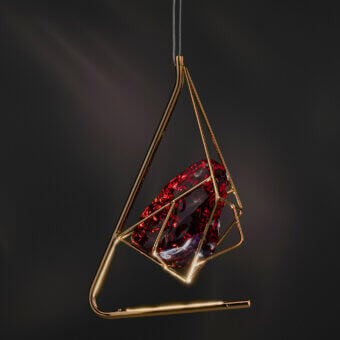 Distinguished Euroluce Cryrock suspension lamp crafted from Tuscan crystal rock with a glossy golden-toned metal framework and red crystalline element