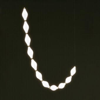 Captivating Euroluce Dewy suspension lamp with undulating form and radiant glow in white translucent material connected with gold-toned metal