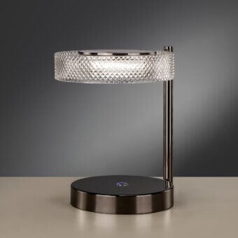 Distinguished Euroluce Eclissi lamp crafted in metal with a glossy dark bronze finish and textured glass with a hand-cut diamond effect