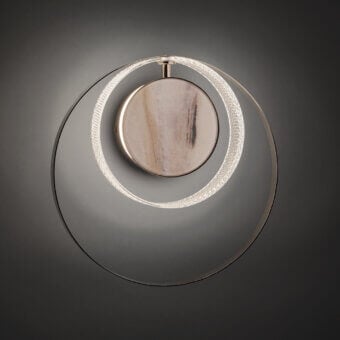 Exceptional Euroluce Eclissi wall lamp crafted with polished metal rings and a satin-finished wooden disc exhibiting a hand-cut diamond effect
