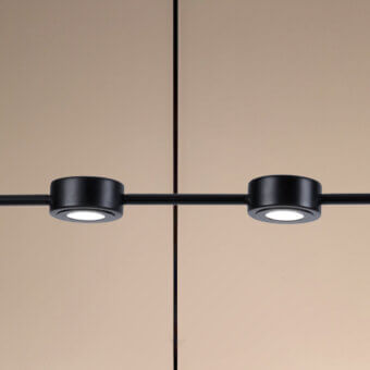 Superior Euroluce Essential Linear suspension lamp crafted in metal with a matte black finish delivering refined illumination