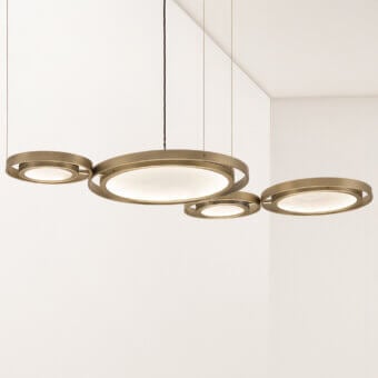 Superior Euroluce Girasole Horizontal lamp crafted in textured metal with warm gold finish and organic asymmetrical arrangement