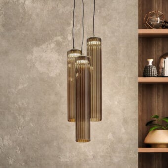 Distinguished Euroluce Itala suspension lamp crafted in transparent glass with warm amber tone and glossy ribbed texture with textured bronze caps