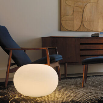 Distinguished FontanaArte Bianca floor lamp with mouth-blown glass and a distinctive silk effect matt white coating
