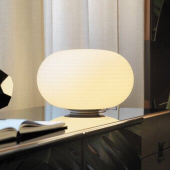 Distinguished FontanaArte Bianca lamp with white mouth-blown glass diffuser and softly textured matt white metal base