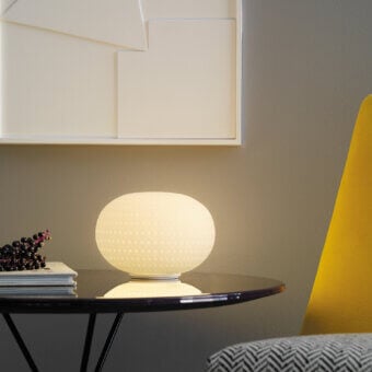 Superior FontanaArte Bianca lamp with textured white mouth-blown glass diffuser and matching disc base