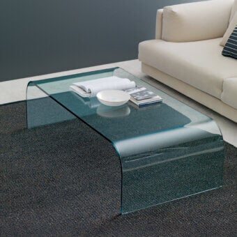 Exceptional FontanaArte Fontana coffee table crafted in transparent glass with a glossy, organically curved silhouette