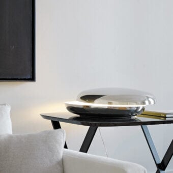 Distinguished FontanaArte Loop table lamp with glossy metal and silver-grey finish offering adjustable bright white illumination
