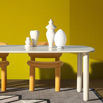 Exceptional FontanaArte Uovo portable lamp sculpted in white satin blown glass with a glossy finish