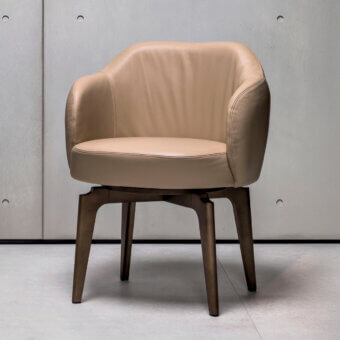 Elegant Giorgetti Elisa armchair upholstered in neutral beige textured fabric with walnut Canaletto swivel base
