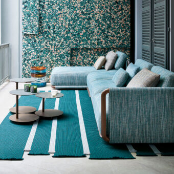 Exceptional Giorgetti Moorea sectional with pewter painted stainless steel and teak, upholstered in textured teal with accent cushions