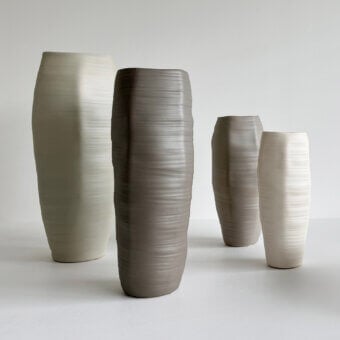 Exceptional Rina Menardi Rocce vase crafted in baked clay with a gently undulating, textured surface and matte finish
