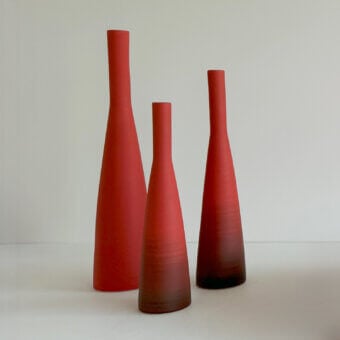 Distinguished Rina Menardi Solo vase crafted in Italy with baked clay, exhibiting a gradient from red to brownish-black and a matte finish