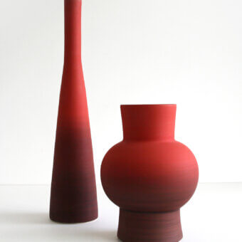 Exclusive Rina Menardi Solo vase crafted from baked clay in a warm reddish-brown hue with a smooth matte finish