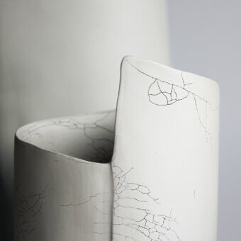 Superior Rina Menardi Torri vase crafted in baked clay with a subtle crackle and off-white matte finish