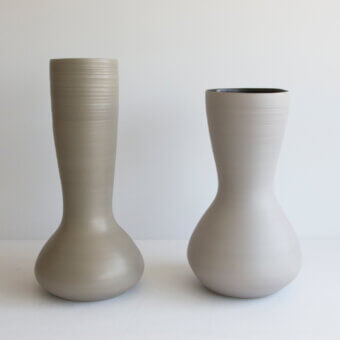 Exceptional Rina Menardi Venere & Zeus vases sculpted from baked clay with a smooth matte finish