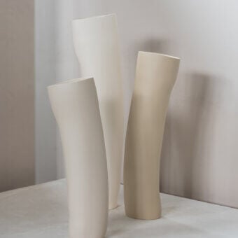 Distinguished Rina Menardi Wind vase sculpted from baked clay in off-white and beige with a matte finish