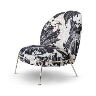 Superior Sicis Amaretto art lounge chair upholstered in black and white mosaic textile with smooth finish