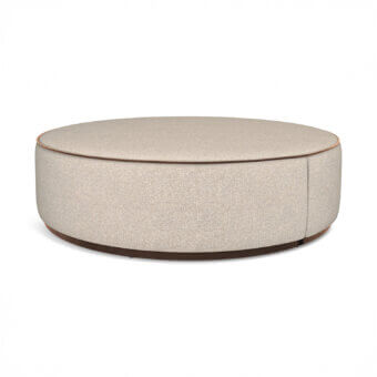 Superior Sicis Chamaleon low round ottoman upholstered in textured beige fabric with a brown wood band